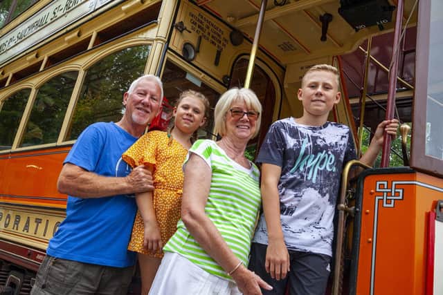 Family about to board a tram at the award-winning centre.