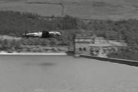 A Lancaster Bomber training over Derwent Reservoir.