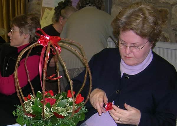 Audrey Marsden of the Ashover Flower Arrangers’ Club working on her Valentine's Day display in 2006.