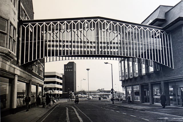 This picture from 1981 shows both the much-loved bridge over Elder Way and the former multi-storey car park in the background.