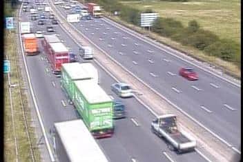 There are long delays on the M1 Southbound between Junction 29 and 28 after a vehicle has overturned following a collision. Credit: Highways England.