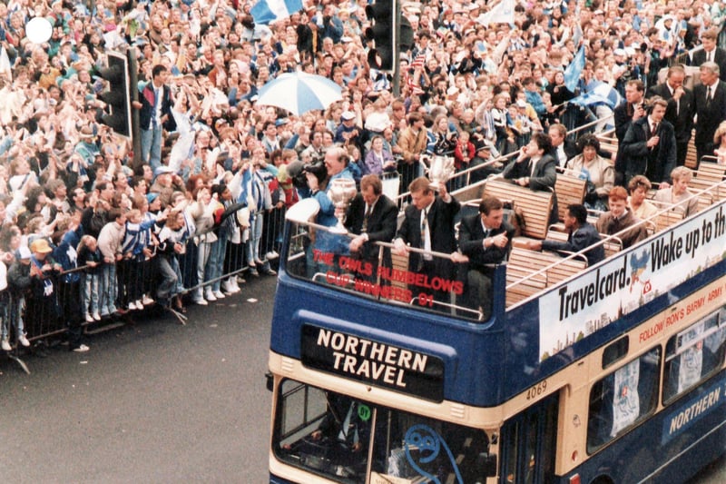 Owls fans line the route as the Sheffield Wednesday players return home with the cup to the city