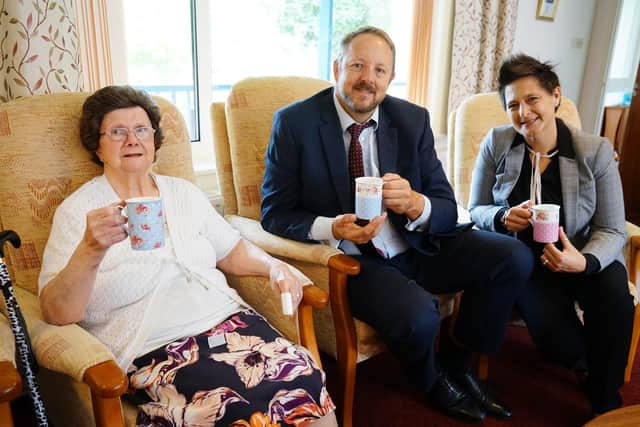 MP Toby Perkins has visited Chesterfield United Charities' St Helens site to talk to staff and residents following the hosuing complex celebrating its 50th anniversary. From the left: resident Kathleen Palmer, MP Toby Perkins and a general manager Jennette Estevez.