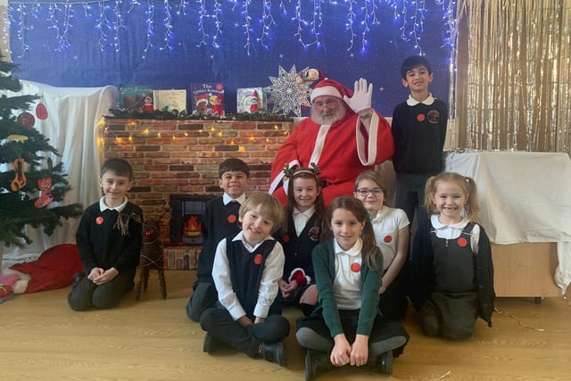 Father Christmas with some of the pupils from The Green Infant School in South Normanton