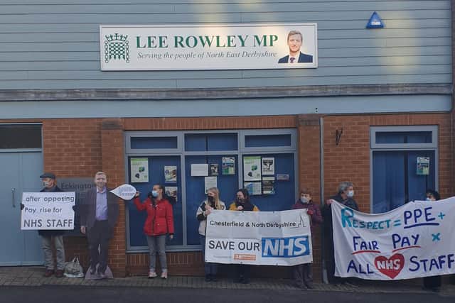 Campaigners outside Mr Rowley's offices.