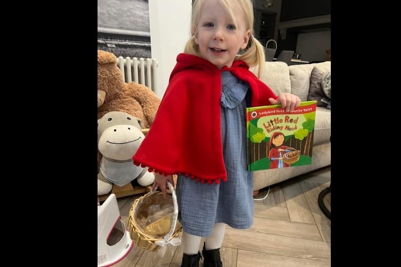 Ayla aged 2, looks lovely as Little Red Riding Hood.