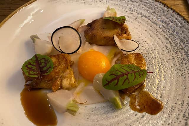 Confit chicken wing with salt baked turnip and confit Burford Brown yolk