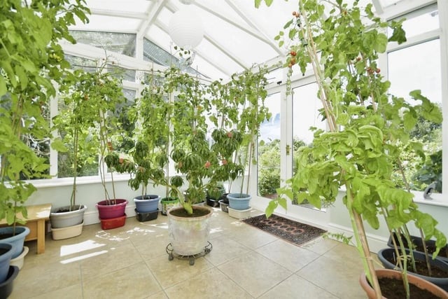 This delightful room has underfloor heating and French doors opening on to the garden.