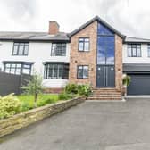 The executive home on Derby Road has an integral garage, a  large parking area in front and is set behind electric gates with a shared driveway leading up to them.