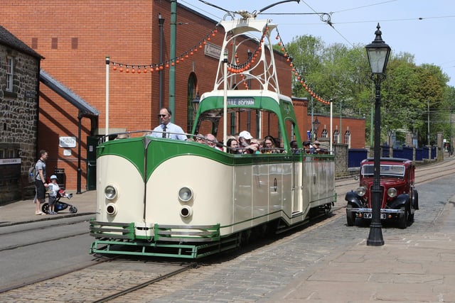 Take a look at the vintage trams on the period street.