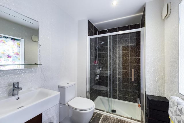 The master bedroom en suite has a shower cubicle, wash basin and wc.