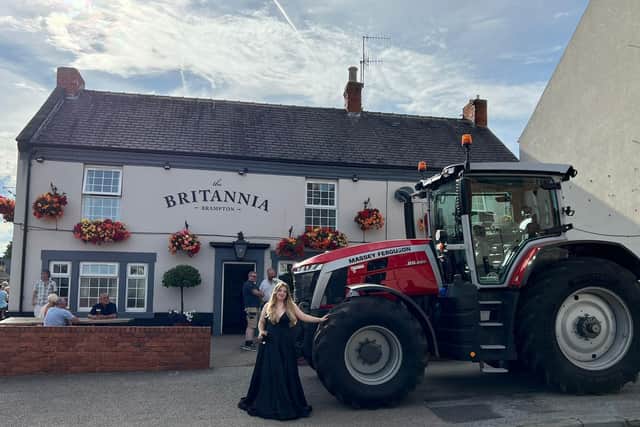 Maddie Needham had a brief refreshment stop at the Britannia Inn, Brampton, during a tractor ride to her prom at Ringwood Hall Hotel.