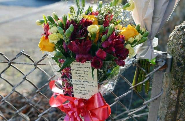 Floral tributes were left on Saltergate following the collision.