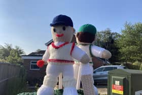 The cricket-themed postbox topper