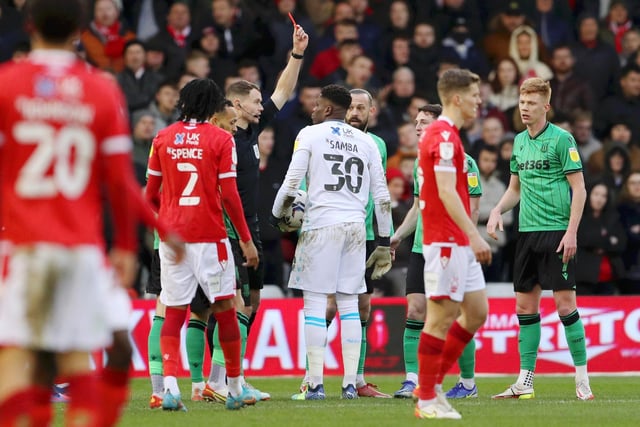 Brice Samba of Nottingham Forest is shown a red card by referee Leigh Doughty against Stoke City. It is one of three reds for Forest this year.