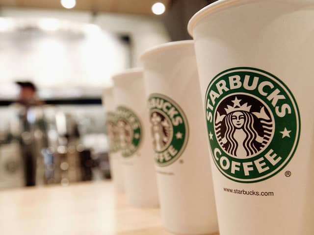 Starbucks coffee cups (Photo by Stephen Chernin/Getty Images)