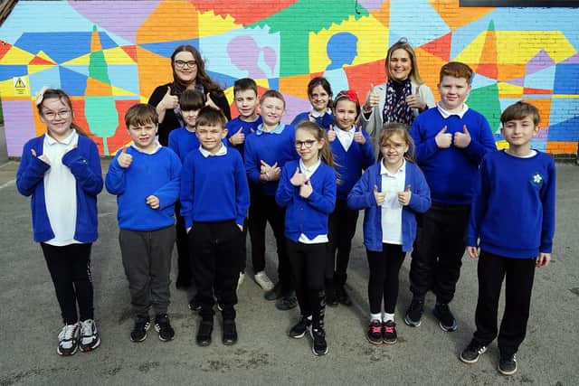 Children at Somerlea Park Junior School in Somercotes celebrate its 'Good' Ofsted rating, with executive head teacher Helina Kirkup and head of school, Daisy Rizo.