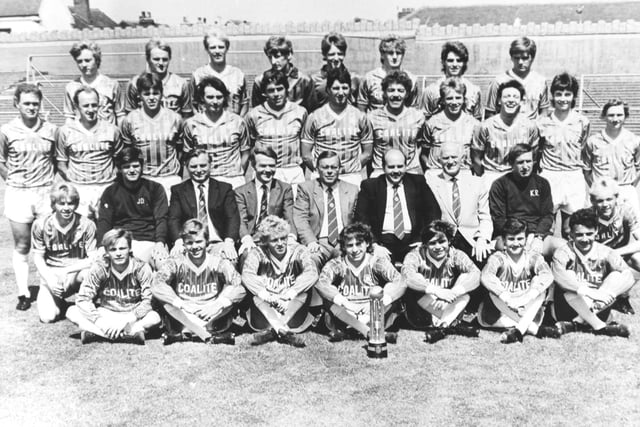 John Duncan (second left on second row) with the 1984/85 squad which won Division Four.