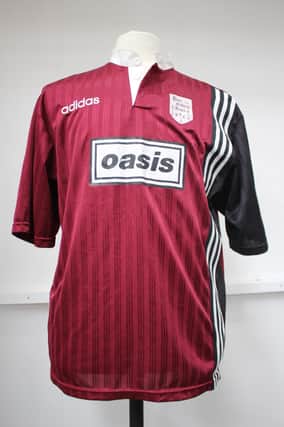 Noel Gallagher wore this shirt at a charity football match in 1996.