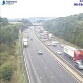 One lane is closed and traffic is queing on the M1 Northbound is Derbyshire due to a broken down vehicle