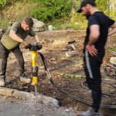 The small work group came equipped with heavy machinery. (Photo: Contributed)