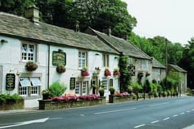 The Chequers Inn, situated below the famous Froggatt Edge.