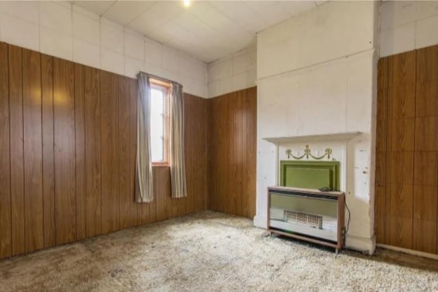 The double bedroom has a gas fire as the original fireplace has been boarded up.