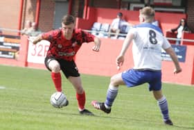 Bailey Hobson in action for Alfreton Town.