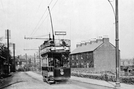 Chesterfield Corporation tram heading down Sheffield Road at Stonegravels. Lockoford Lane goes off to the right in front of terraced houses. The pair of cottages in the background are at the junction of Dark Lane which later became Peveril Road. The terraced houses on the horizon are on Nelson Street. Trams were replaced by trolley buses in 1972 and motor buses came along 11 years later.