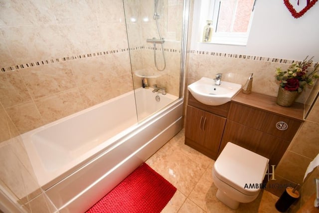 Set among the bedrooms on the second floor of the Meadow View house is this family bathroom.