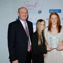 Players from Middleton and Wirksworth girls under 13s cricket team celebrate an award at the 2010 Derbyshire Sports Awards.