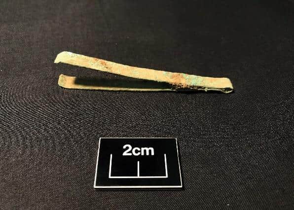 Roman tweezers found at the site.