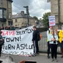 Dozens of people gathered to protest outside Buxton Methodist Church