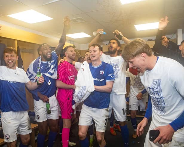 Chesterfield players celebrate inside the dressing room. Picture: Tina Jenner