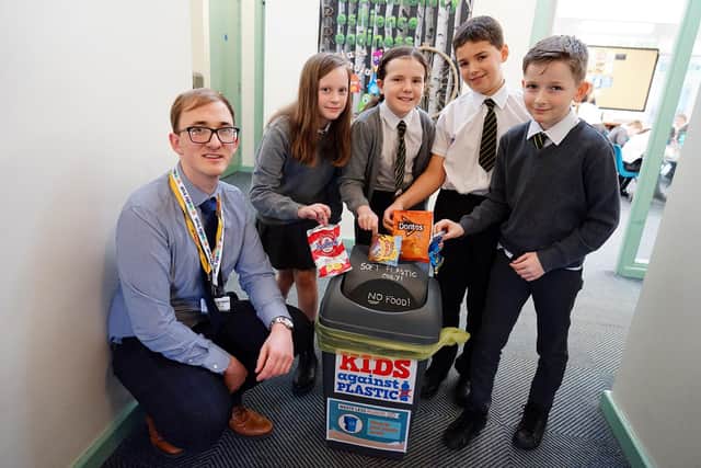 Walton Holymoorside Primary School youngsters have been taking part in an environmental project. Teacher Connor Macnamara with Year 5 and 6 students.
