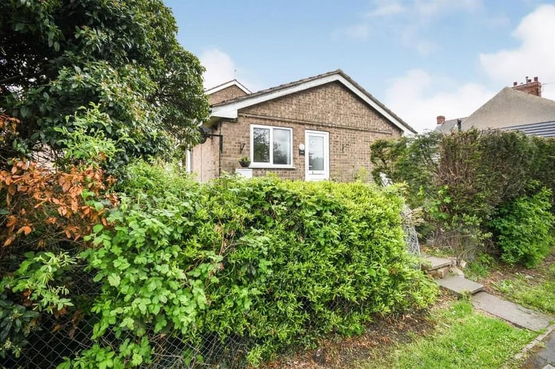 This "well-presented", two-bedroom detached bungalow is for sale by modern auction , for a guide price of £165,000, with William H Brown.