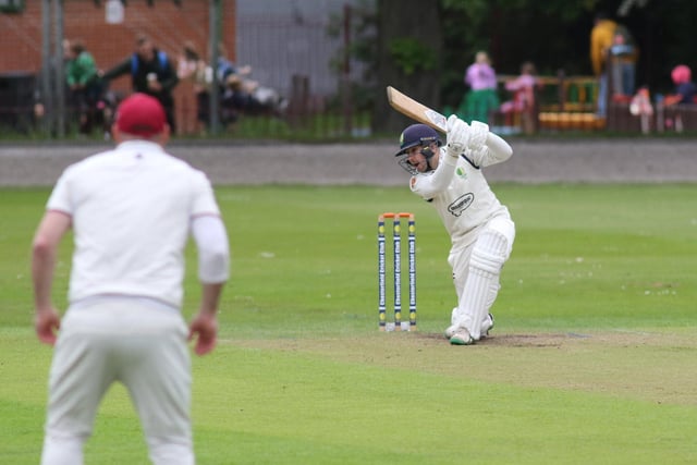 Callum Hiron hits a boundary on his way to top scoring for Chesterfield against Ockbrook and Borrowash.