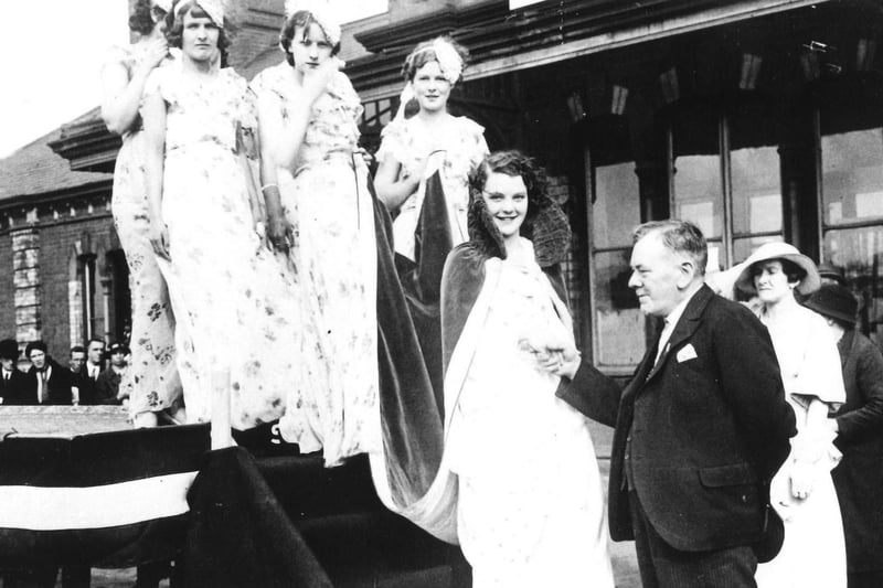 Chesterfield Carnival Queen (Evelyn Fox) and attendants at the Midland Station in 1935 on their way to Queen’s Park for the crowning of the Queen ceremony – Derbyshire Times
