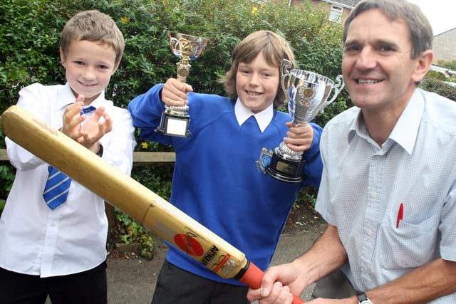 Steve Lawrence, teacher at Old Hall Primary School, Brampton, Chesterield recieved a cricket award from Mike Gatting in 2008. Pupils Chistopher Thompson, left and Jordan Reynolds helped celebrate his success.
