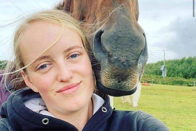 Gracie Spinks with her horse Paddy.