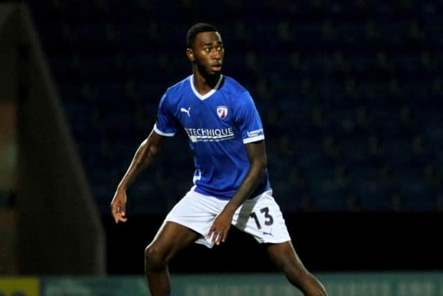 Milan Butterfield scored his first goal for Chesterfield to equalise against Stockport, and then rolled in the winning penalty.