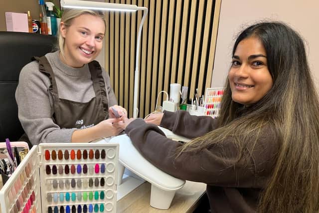 Meg Allcock,(left) of Nails With Meg, with customer Keri Kundasamy.