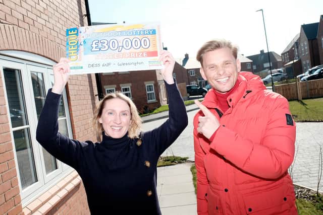 Sarah Godney, 41, said she was 'totally stunned' to received a £30,000 prize cheque