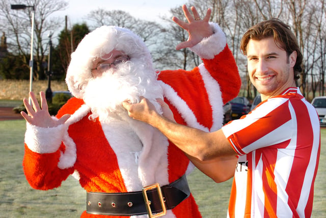 Santa gets some training in with Sunderland star Lorik Cana in support of the Grace House event called Santa Saunter 11 years ago. Does this bring back happy memories?