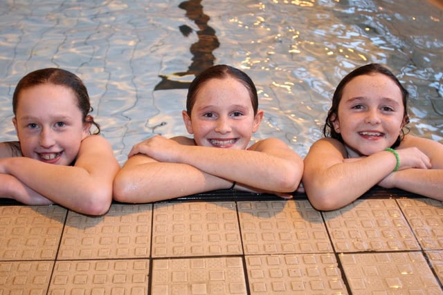 Clay Cross girls Abbie Barlow, Georgia Patilla and Sophie Patilla, left to right, raise £434.90 in a sponsored swim for Haiti.