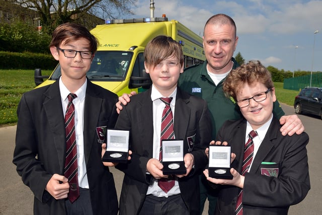Students from Brookfield Community School receive the Laverick Award from East Midlands Ambulance Service for saving a man that fell in the river at Somersall Park, pictured from left are Joe Davis, George Beresford, heart teamleader Grant Whiteside and Louie Grayson in 2016