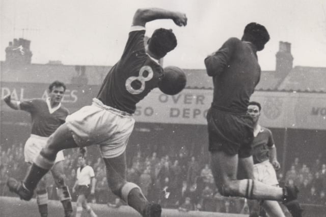 Chesterfield vs Grimsby Town in 1960. Our photo shows shows Barnett the Grimsby Town goalkeeper making a save off the head of the Chesterfield inside right Havenhead from a pass by Frear.