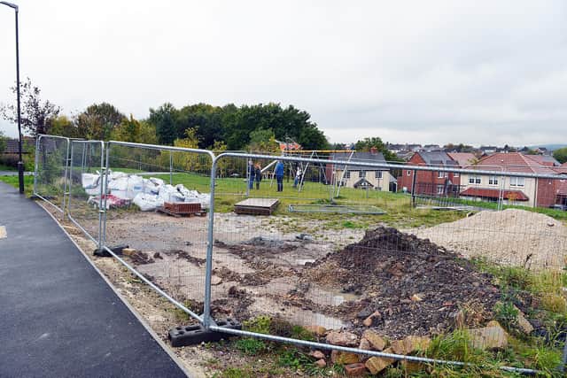 Problems with 'dangerous' play area on new Chesterfield housing estate.