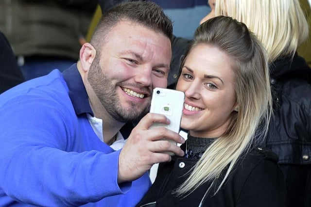 Two Wednesday supporters take a selfie at Leeds United's Elland Road.
