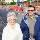 Martin Hague and Eva Rasen are pictured here - with Martin criticising the creation of the new traffic island.
